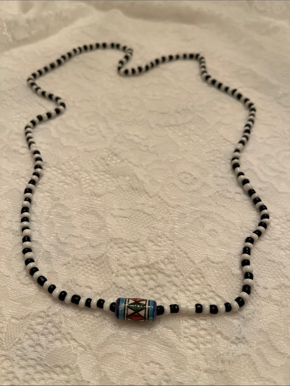 Black & White Beaded Necklace with Multicolor Center Bead
